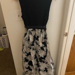 Black and floral print high low dress.